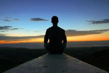 A Man on A Concrete Looking at Horizon